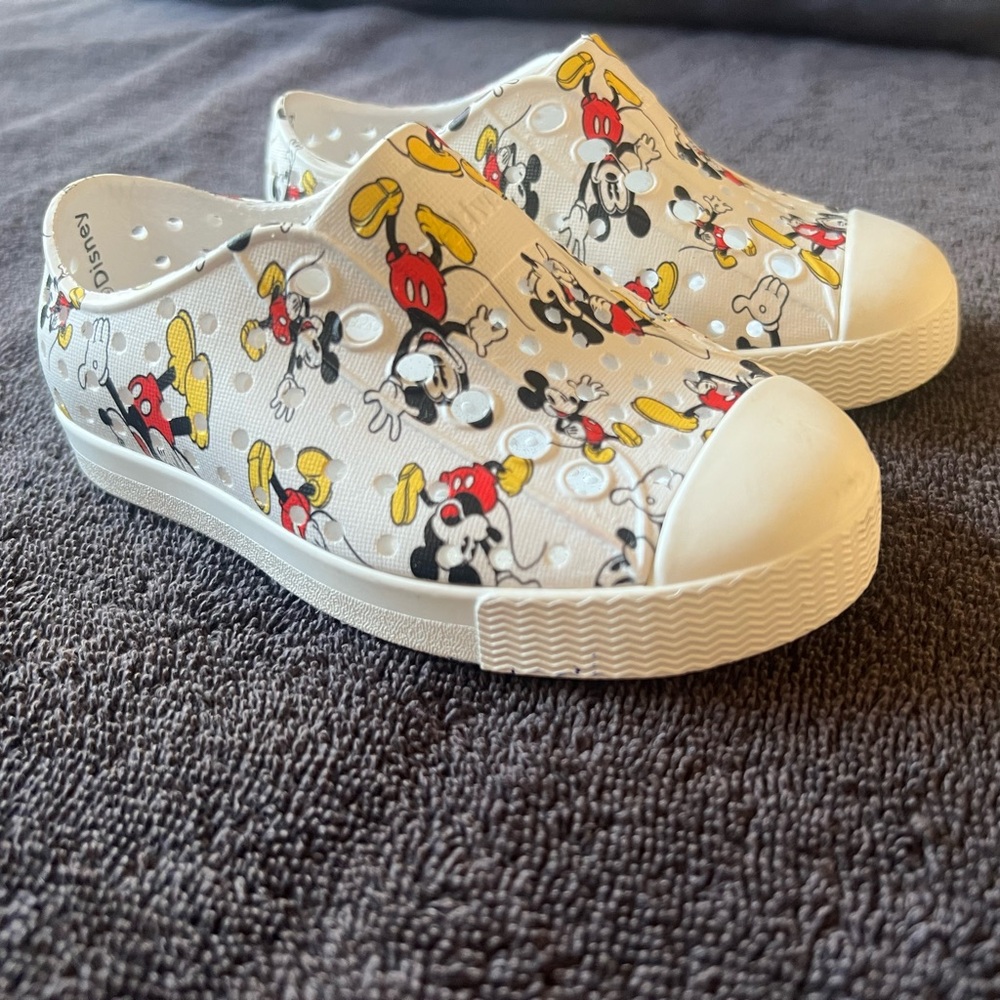 Native Shoes Kids White Mickey Mouse Slip-Ons with Red and Yellow Accents
